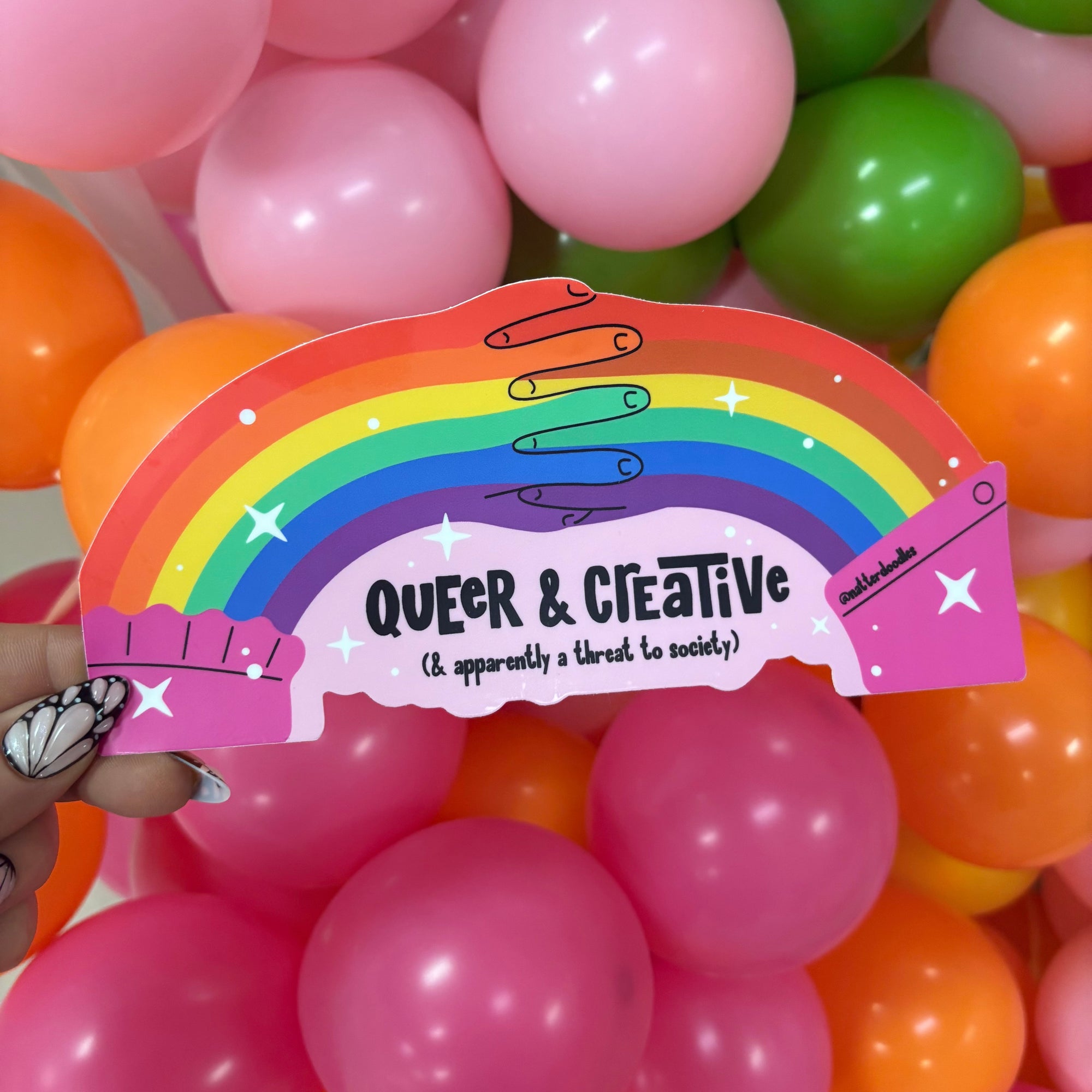 Queer and Creative and Apparently a Threat to Society Sticker