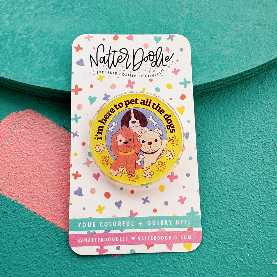 Nutter Doodle acrylic pin
 with cartoon characters on a white background