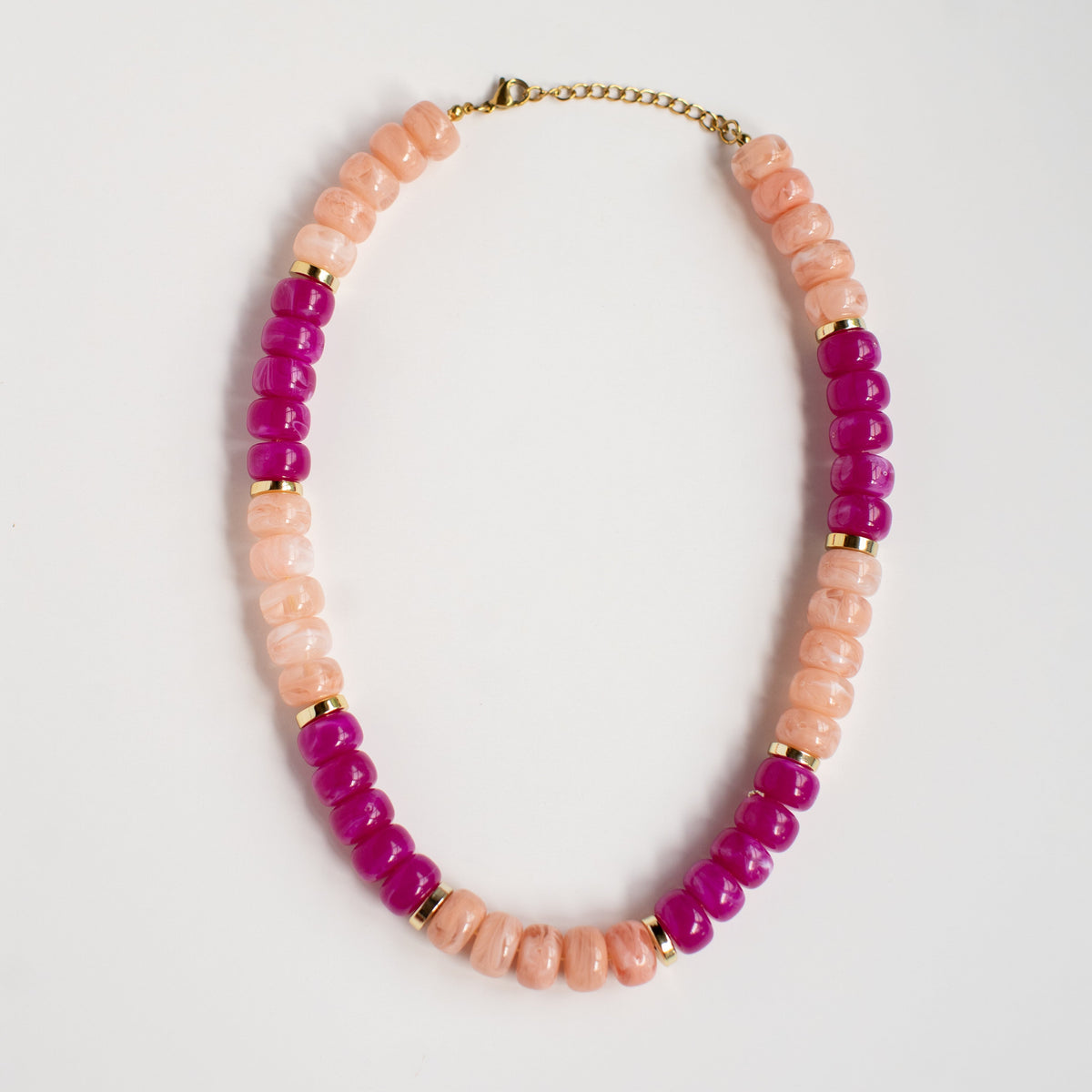 Berry Blush acrylic beaded necklace by NatterDoodle, front view on a white background