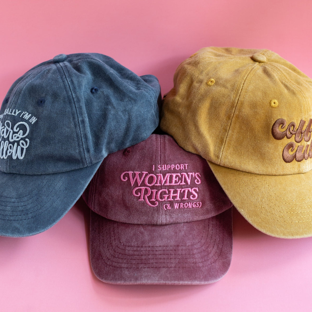 Burgundy feminist dad cap styled as a funny gift for Women's History Month and International Women's Day
