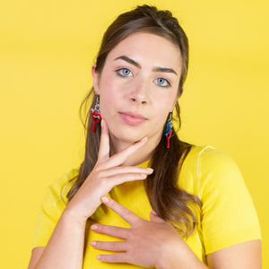 Woman wearing a yellow shirt against a yellow background