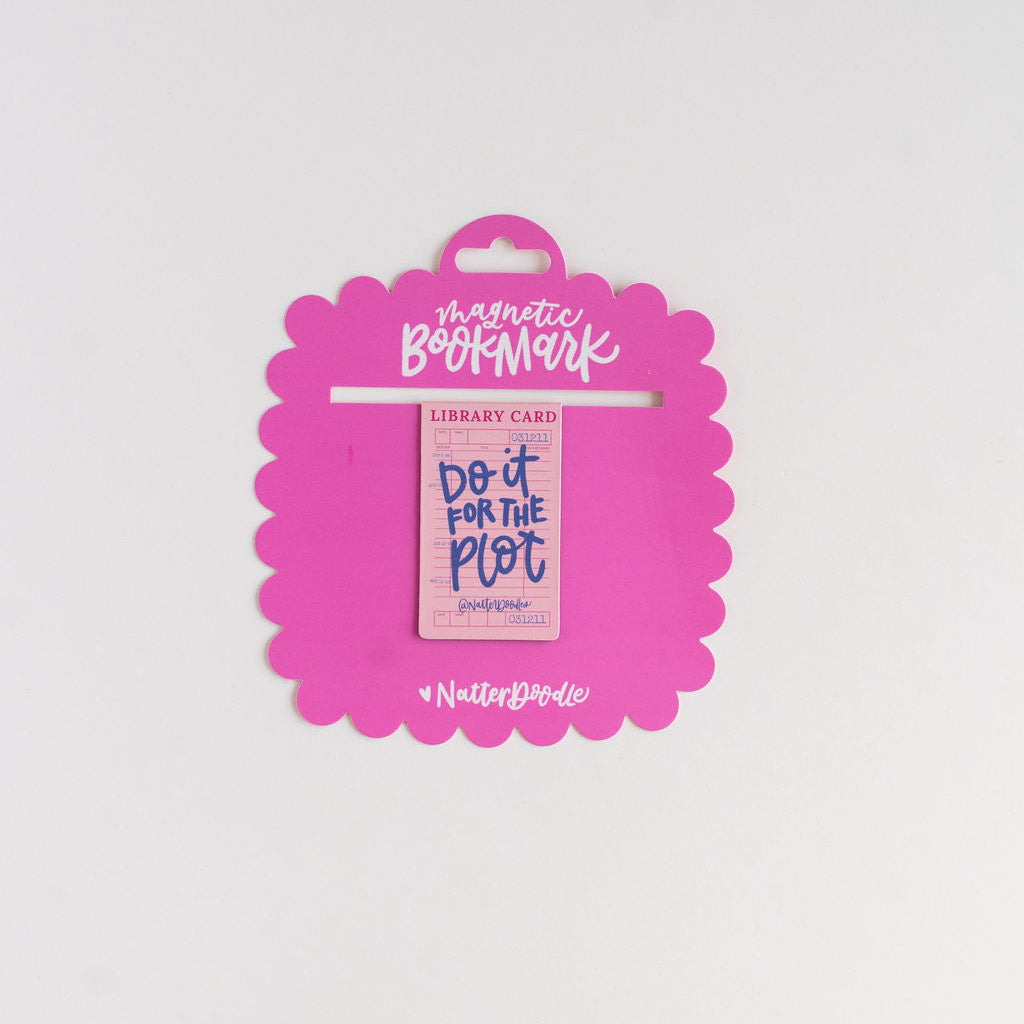 Magnetic bookmark on a pink packaging with text on a light gray background