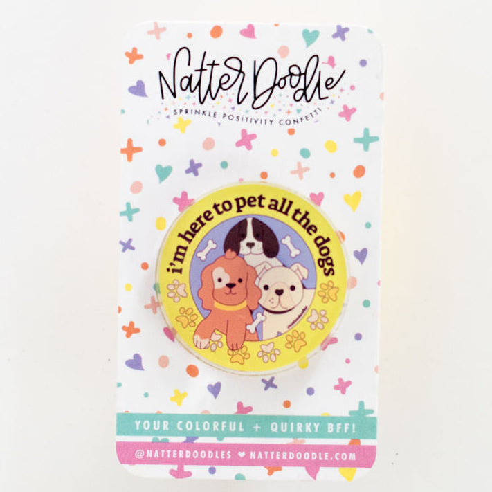 Nutter Doodle acrylic pin
 with cartoon characters on a white background