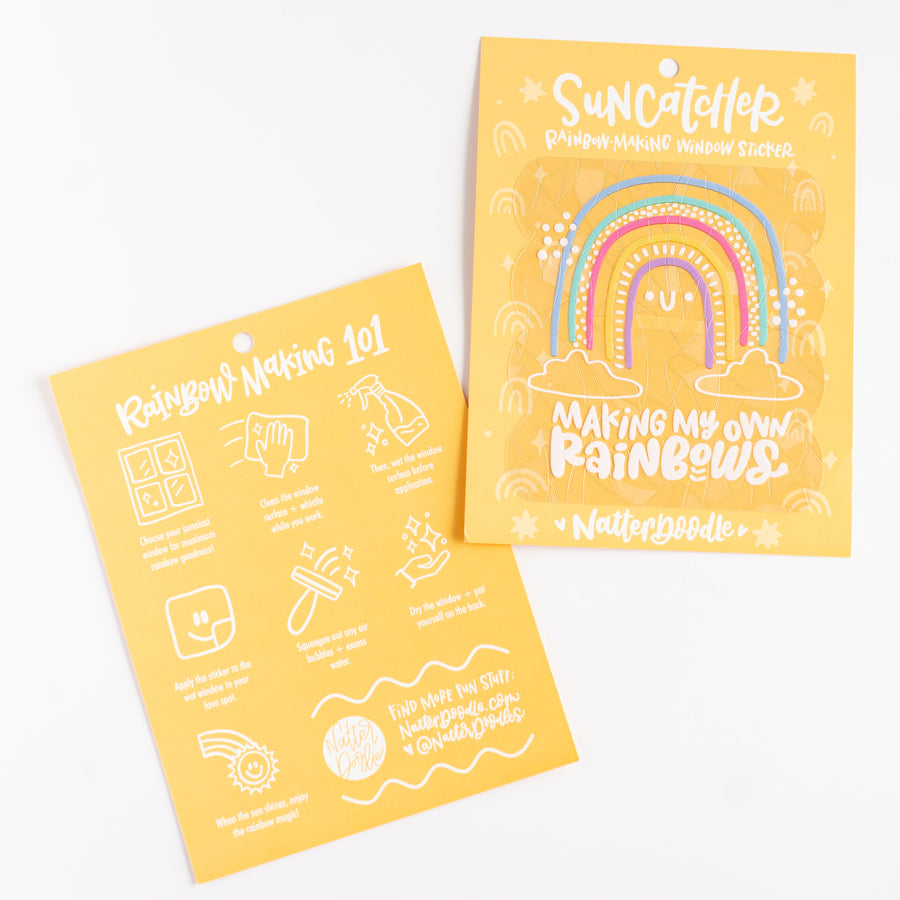 Yellow craft kit packaging with rainbow design and text on a white background