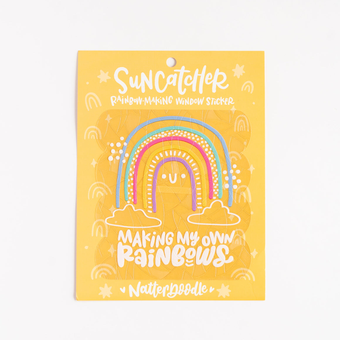 Yellow craft kit packaging with rainbow design and text on a white background