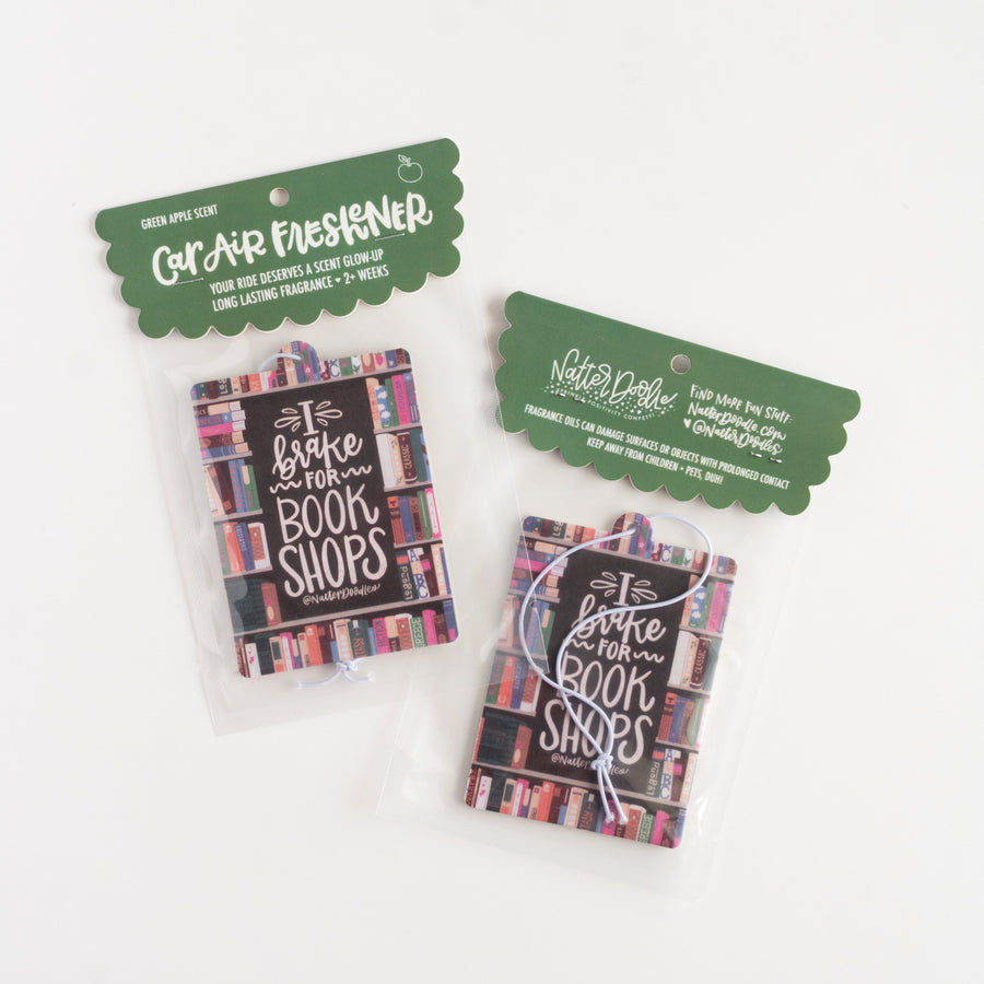 Car air freshener packaging with book-themed design on a white background