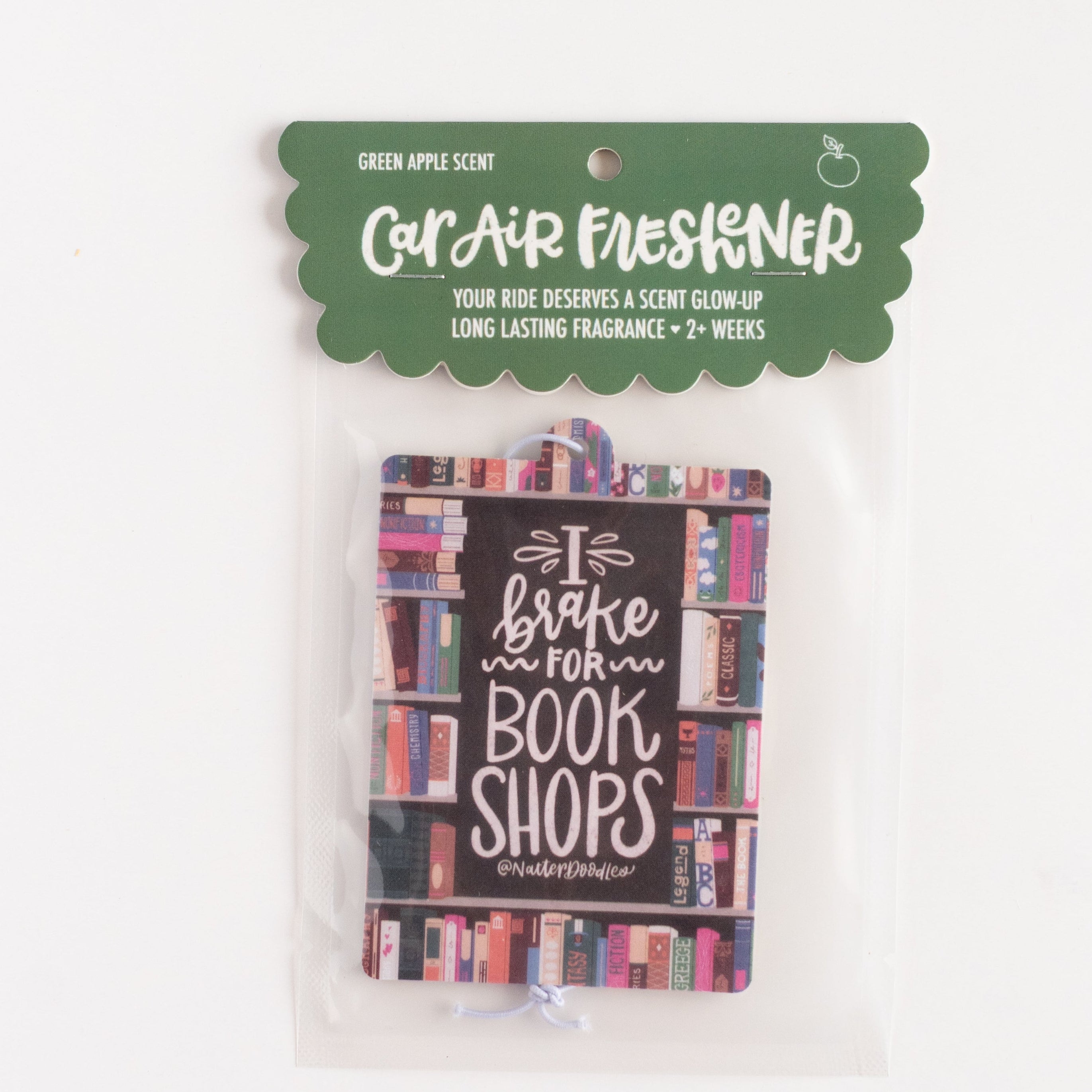 Car air freshener packaging with book-themed design on a white background