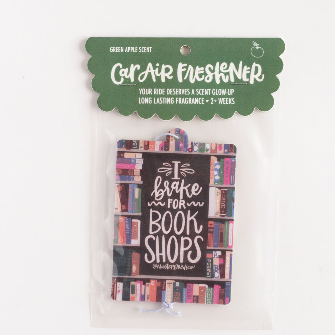 Car air freshener packaging with book-themed design on a white background