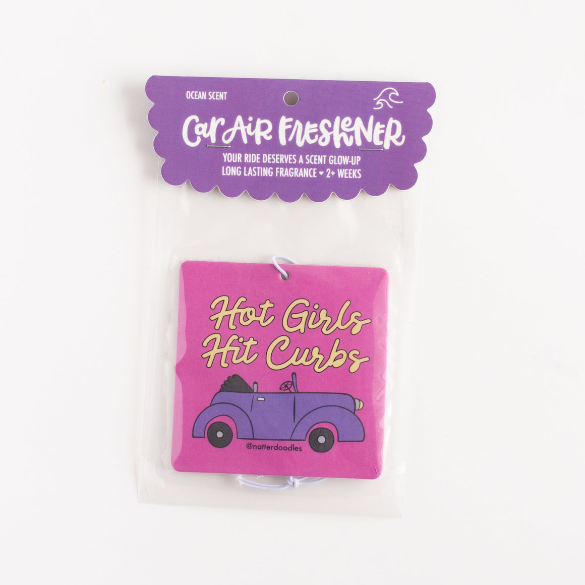 air freshener that says hot girls hit curbs
