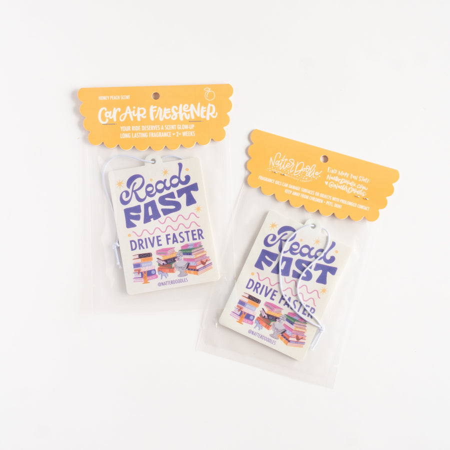 Car air freshener packaging with text on a white background