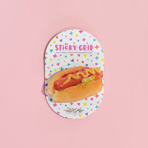 Sticky crib with hot dog design on a pink background