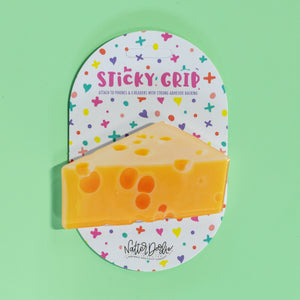  Sticky grip pad with cheese design on a green background