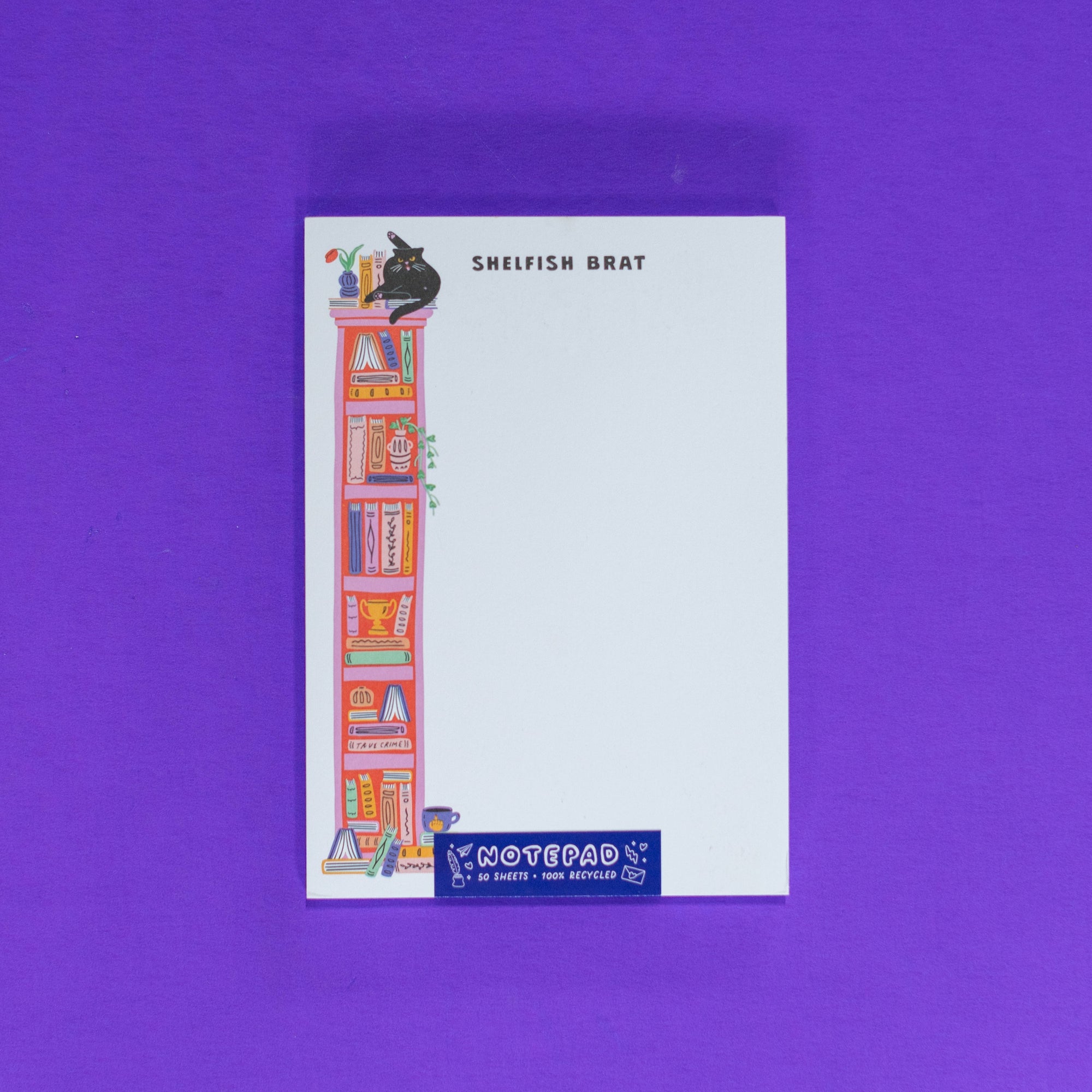 Notepad with colorful illustrations on a purple background