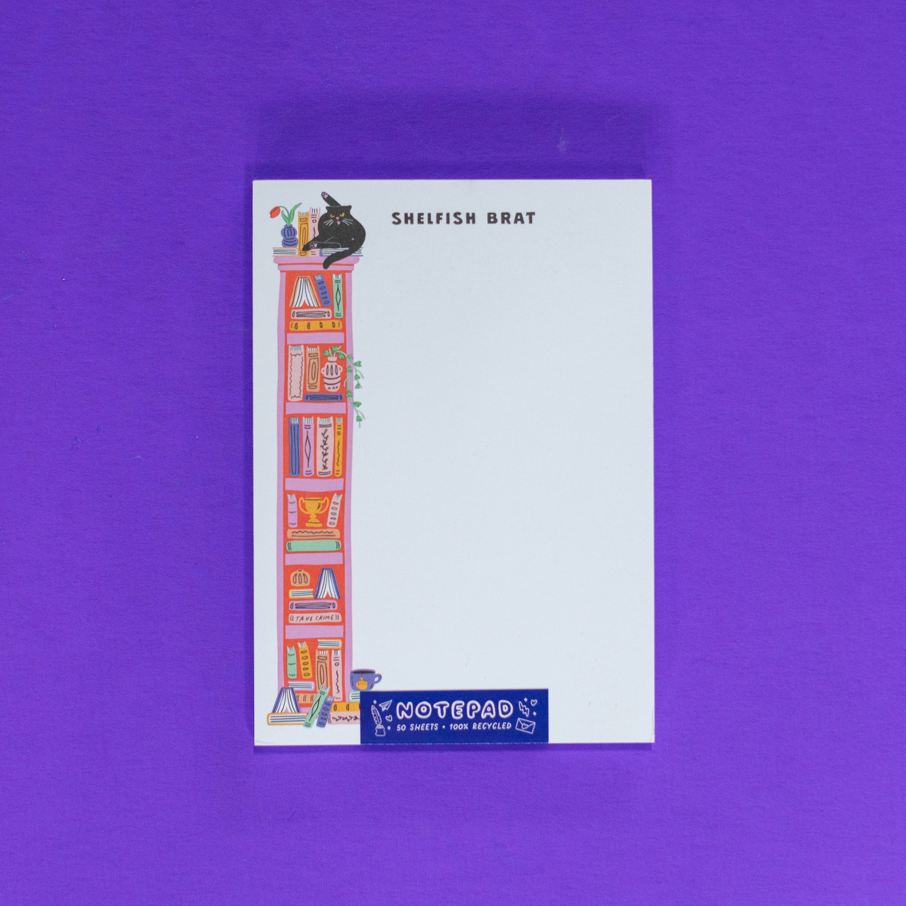 Notepad with colorful illustrations on a purple background