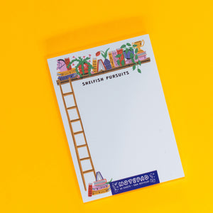 Notepad with colorful design on a yellow background