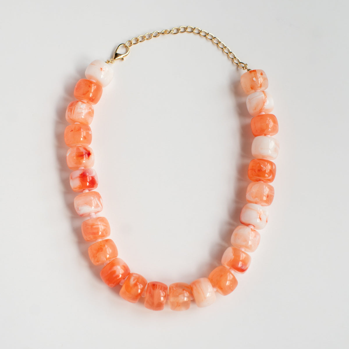 Main Squeeze acrylic beaded necklace by NatterDoodle, front view on a white background