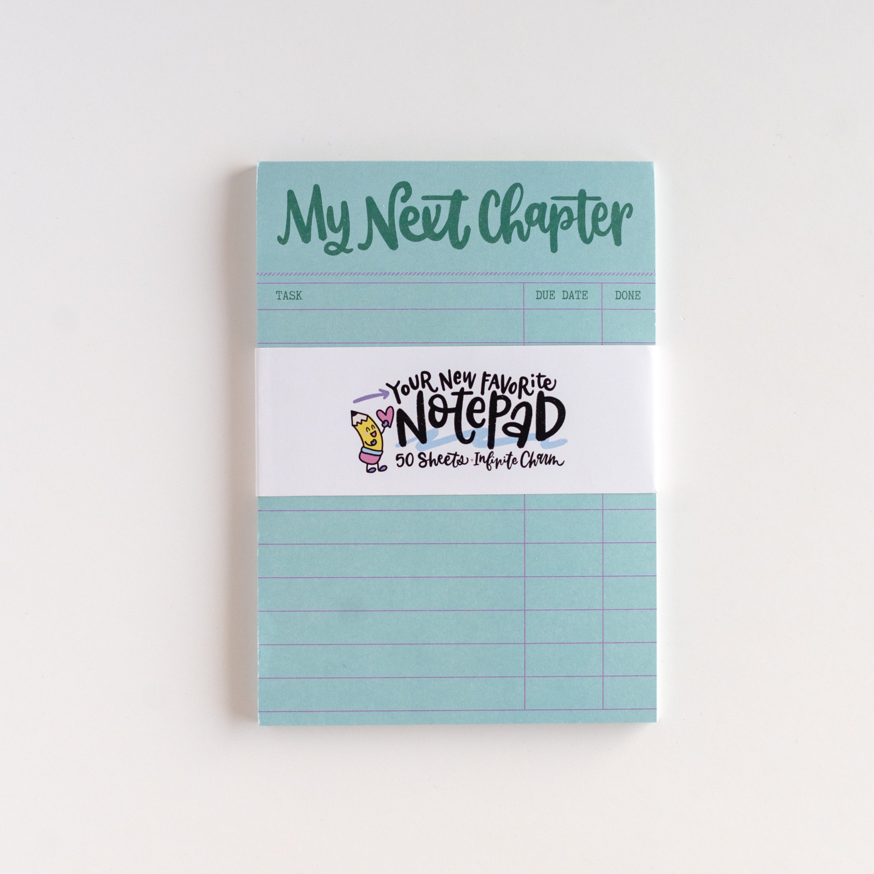 Notebook with 'My Next Chapter' text on a white background
