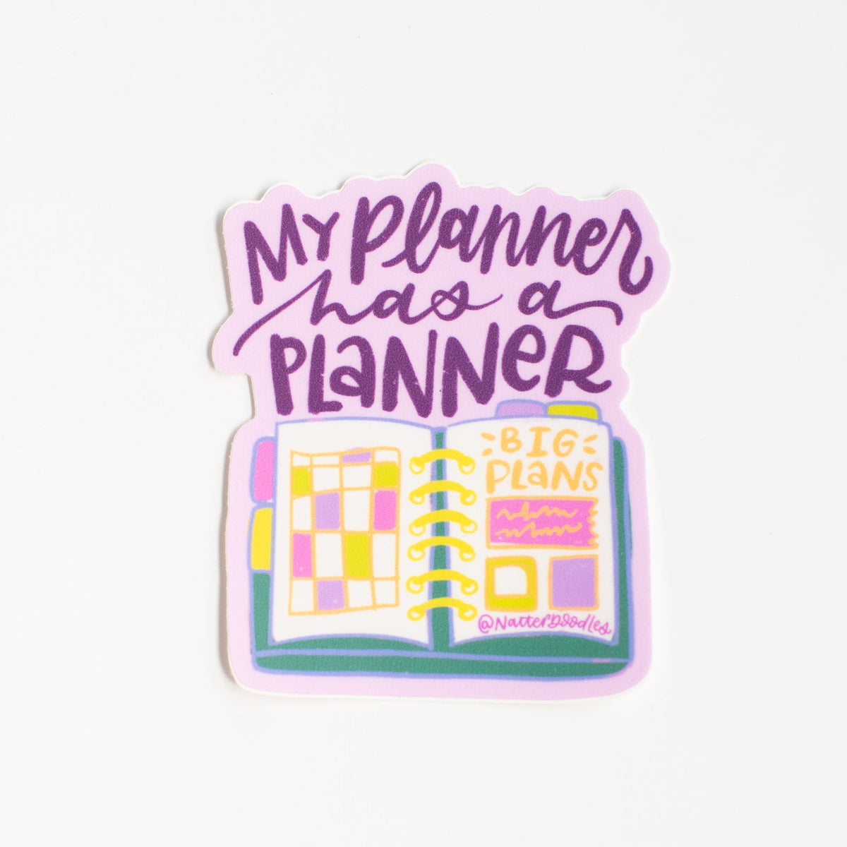 My Planner Has a Planner vinyl sticker with purple hand lettering above a colorful open planner on a lavender background