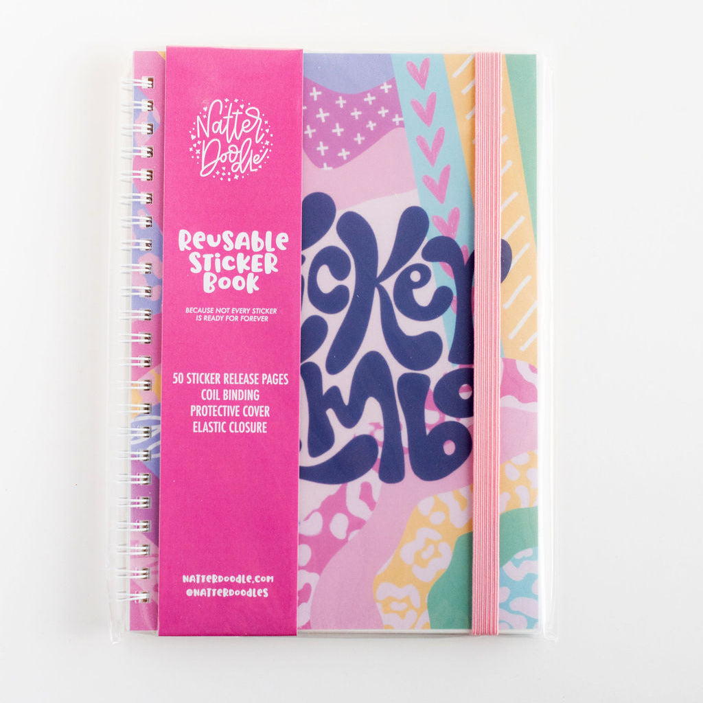 Reusable sticker book with colorful design and pink cover on a white background