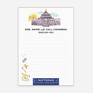 Notepad with a building illustration and text on a white background
