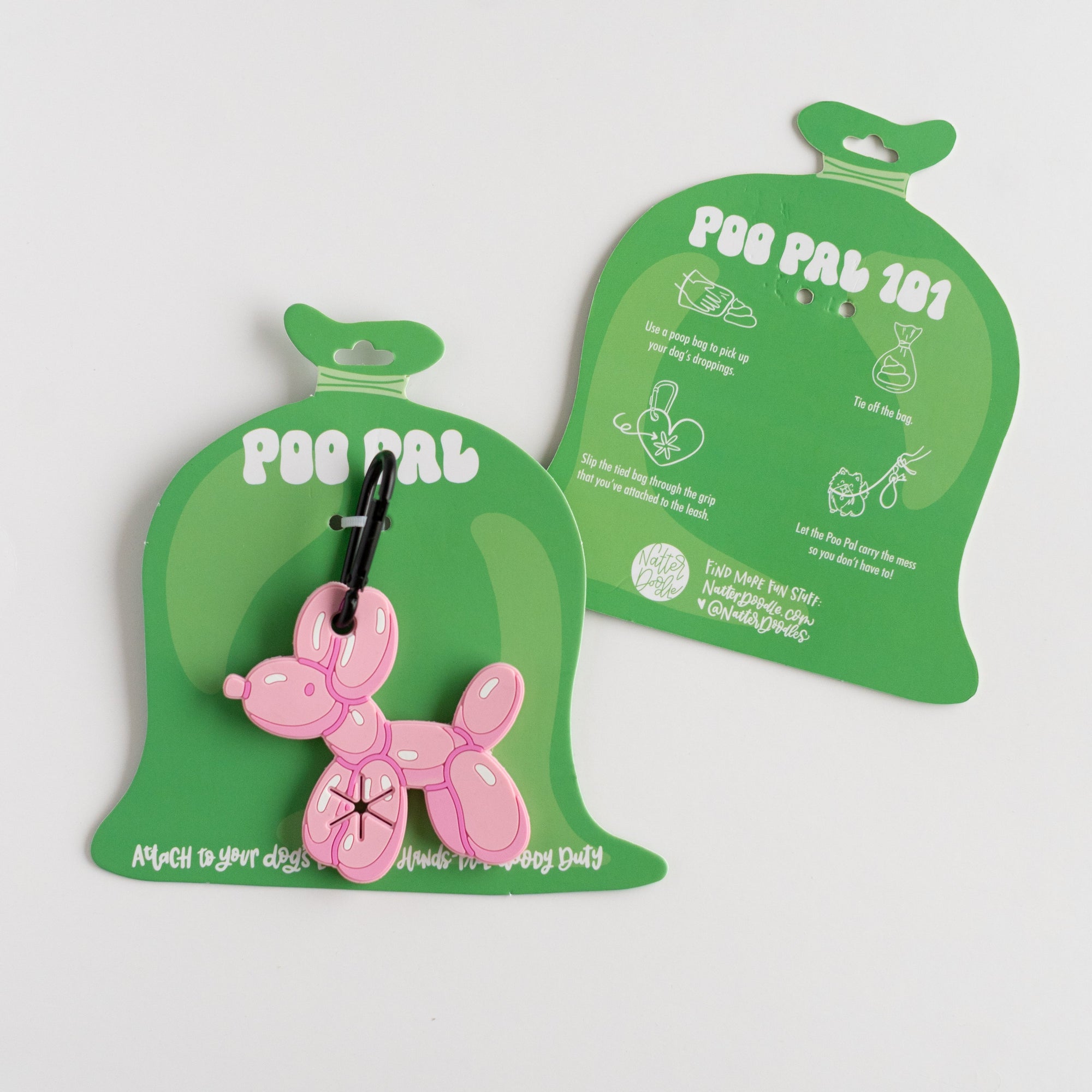 Pink balloon dog poop bag holder on a green card with branding on a white background