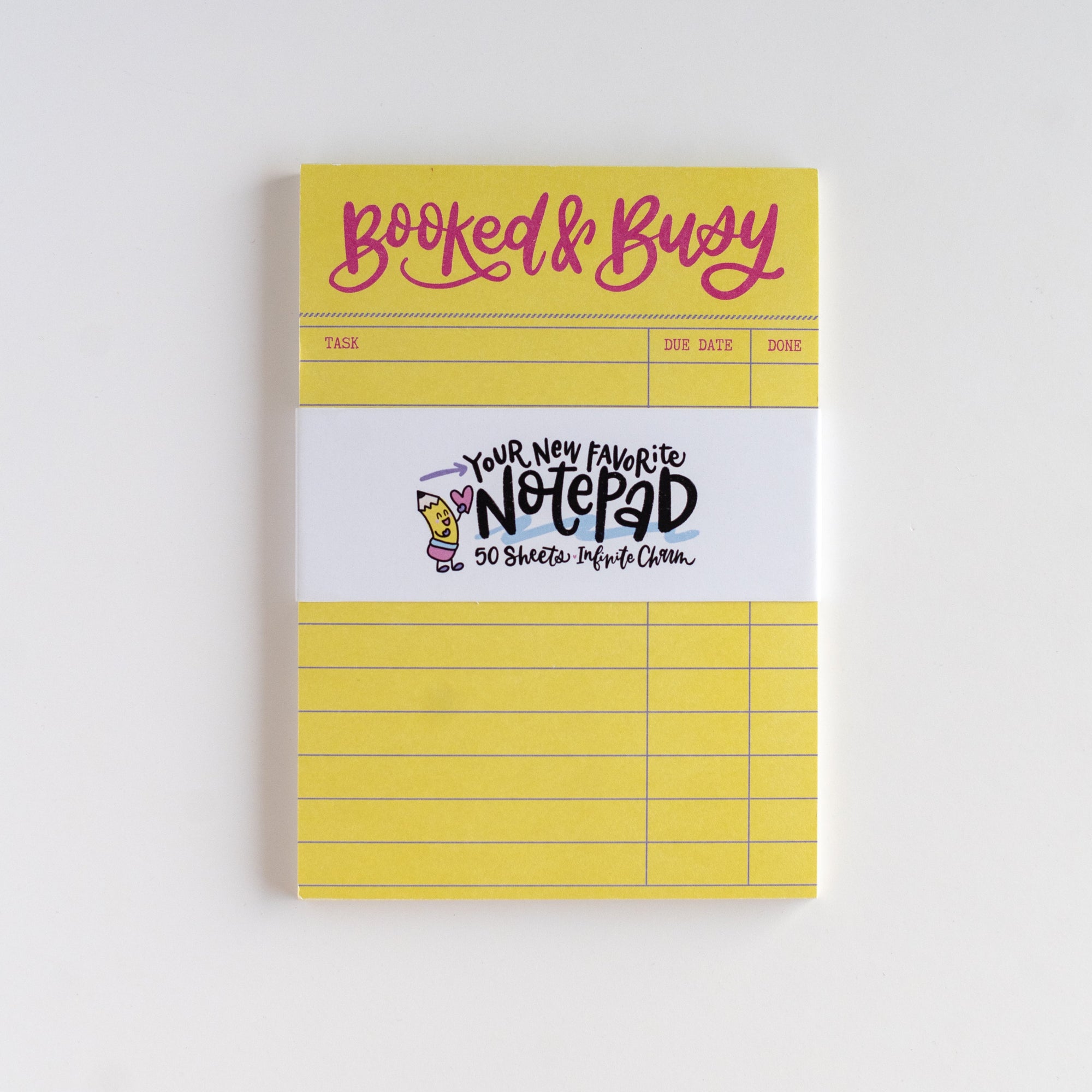 Yellow notepad with text on a white background