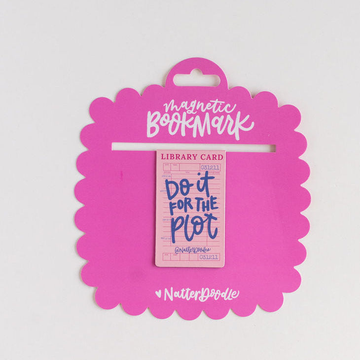 Magnetic bookmark on a pink packaging with text on a light gray background