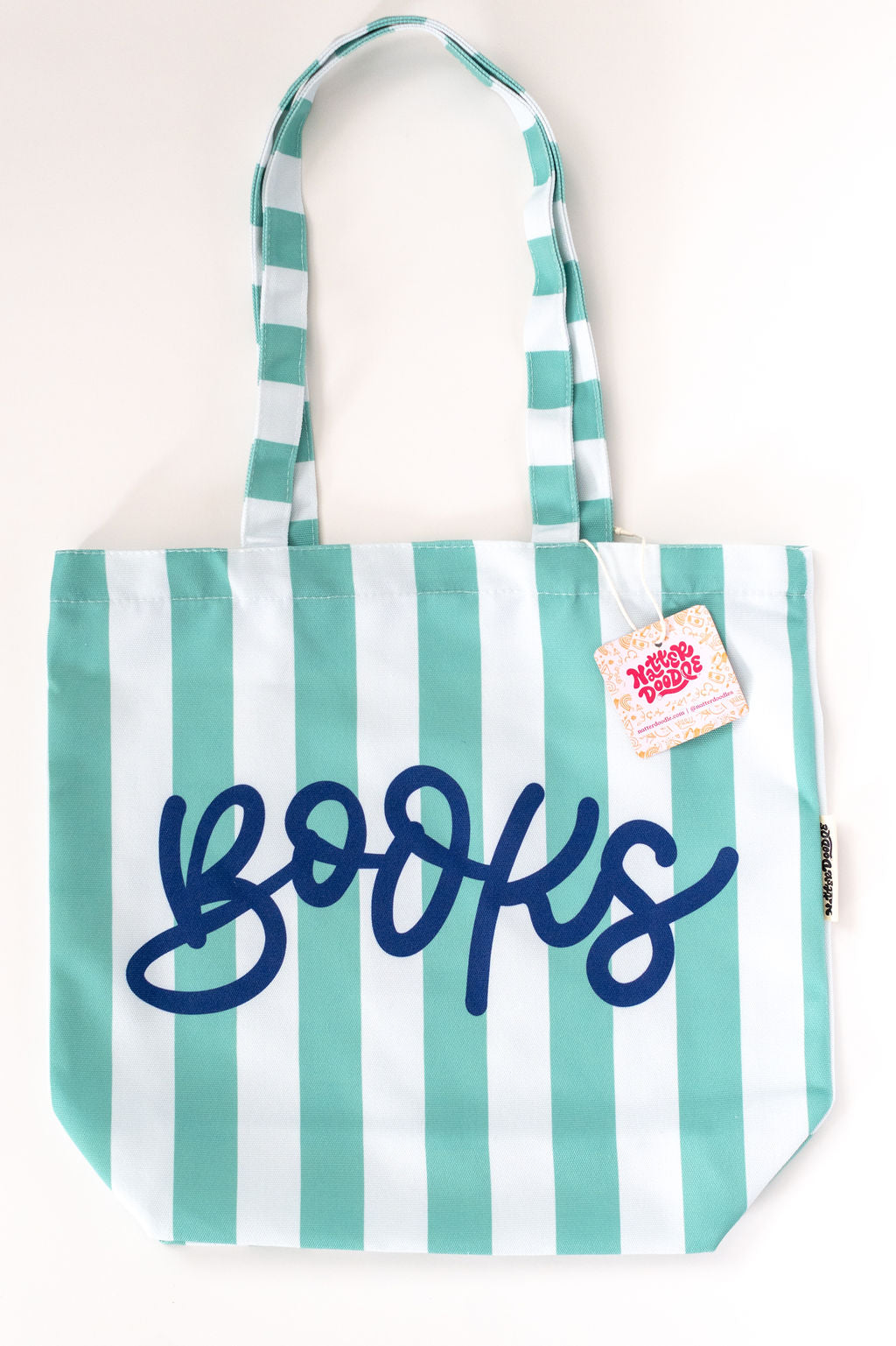 Tote bag with teal and white stripes and 'books' text on a white background
