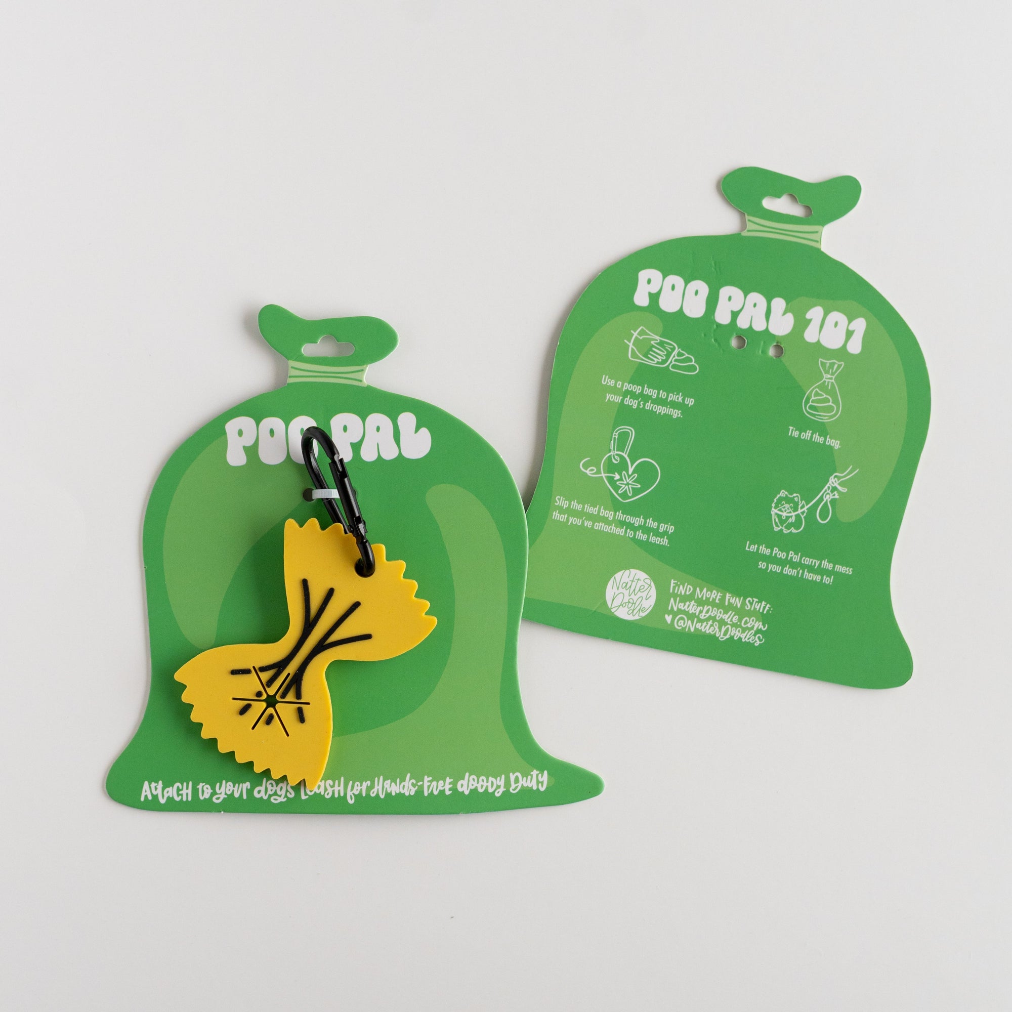 Two green pet waste bags with a yellow dog graphic on a white background