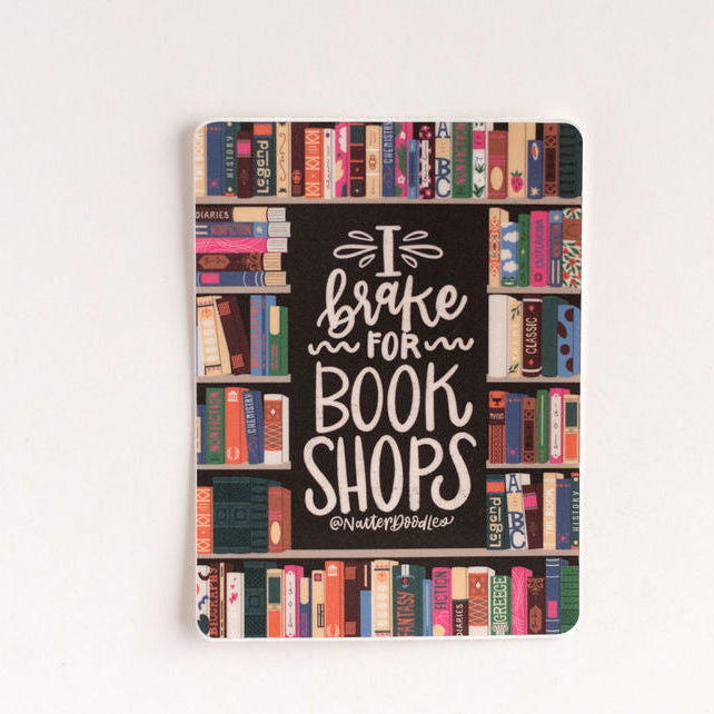 Sticker with colorful book spine design on a white background