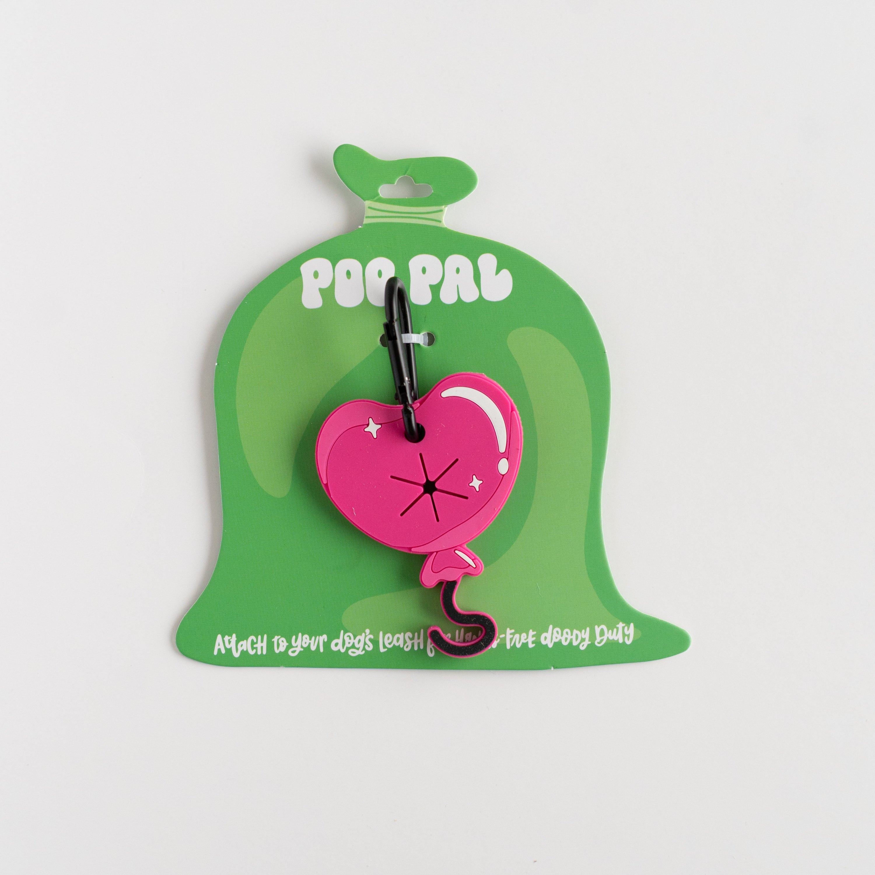 Pink heart-shaped pet accessory with a green packaging label on a white background