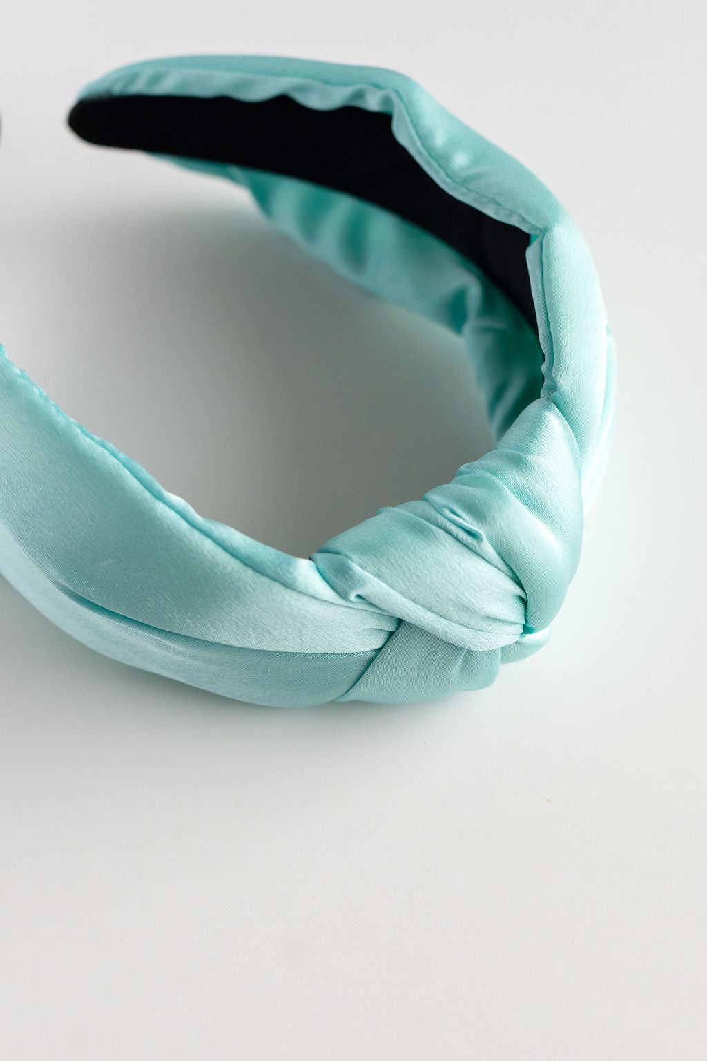 Light blue headband on a white background