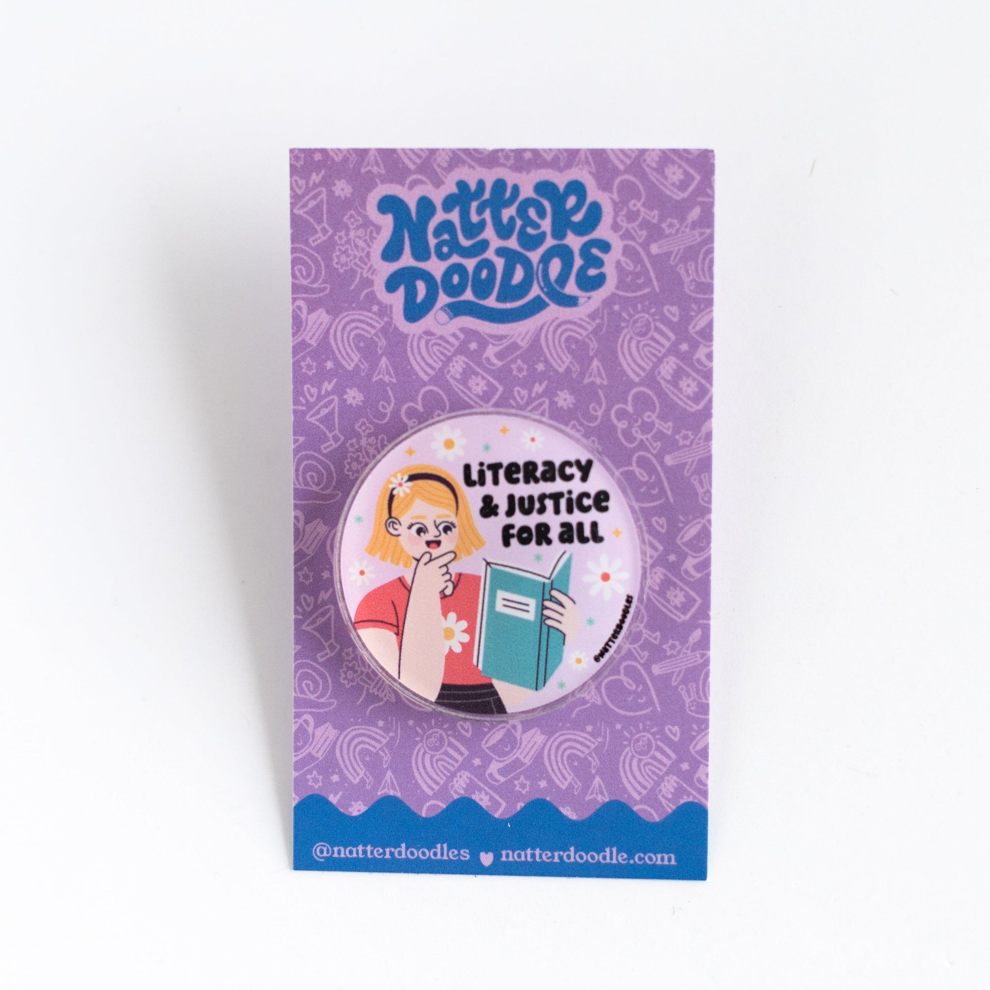 Button badge with illustration and text on a purple card