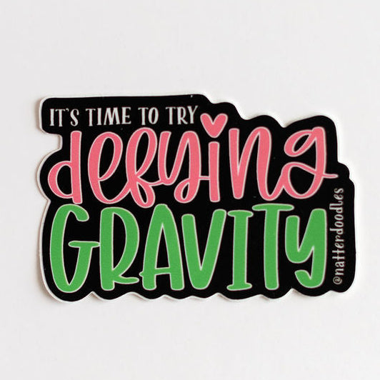 Defying Gravity Sticker