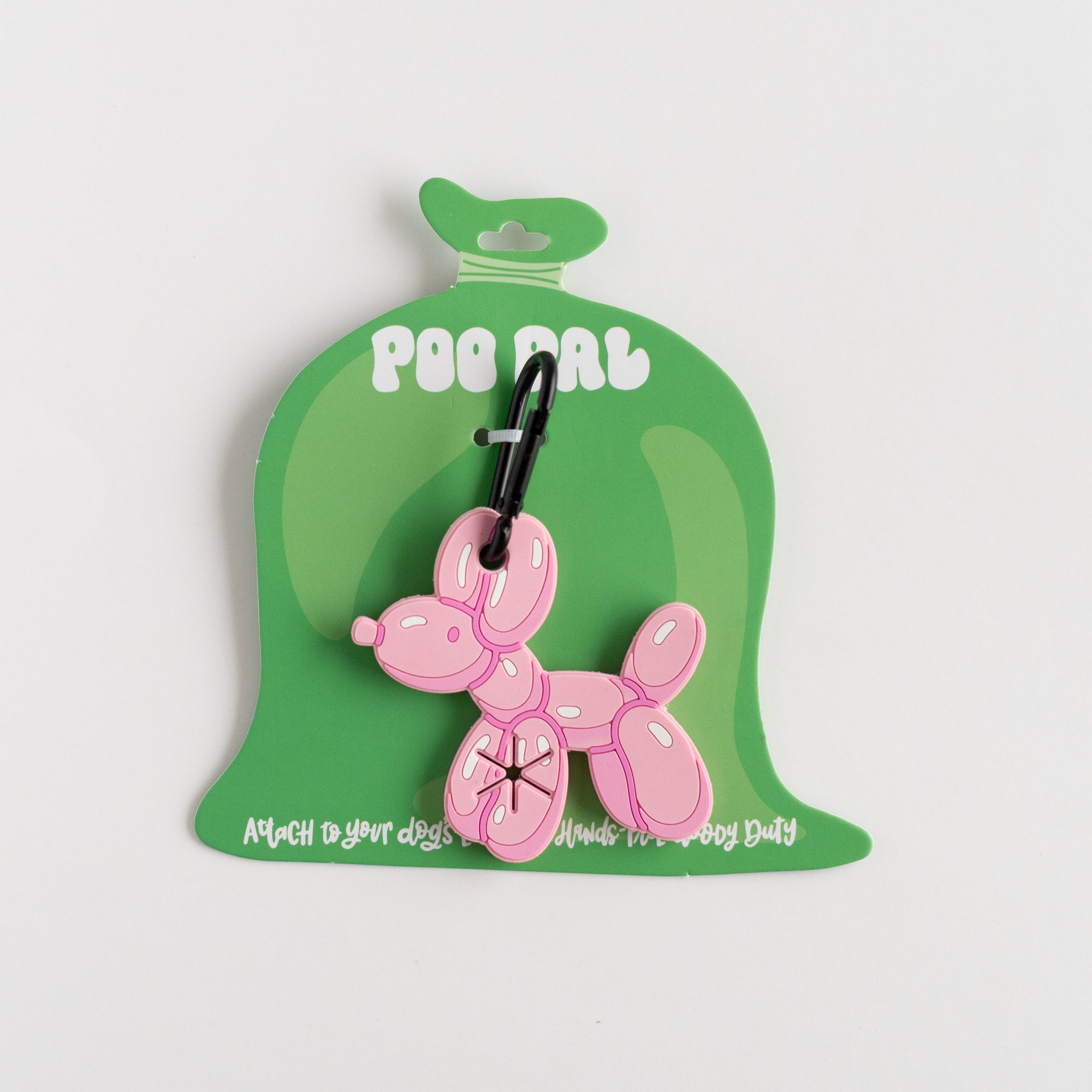 Pink balloon dog on a green card with 'Poo Pal' branding on a white background