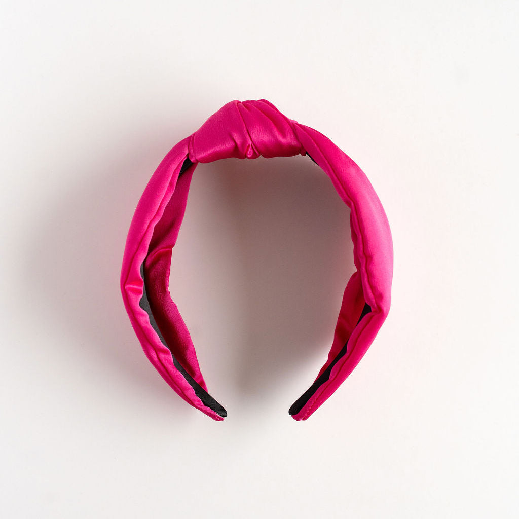 Pink headband on a white background
