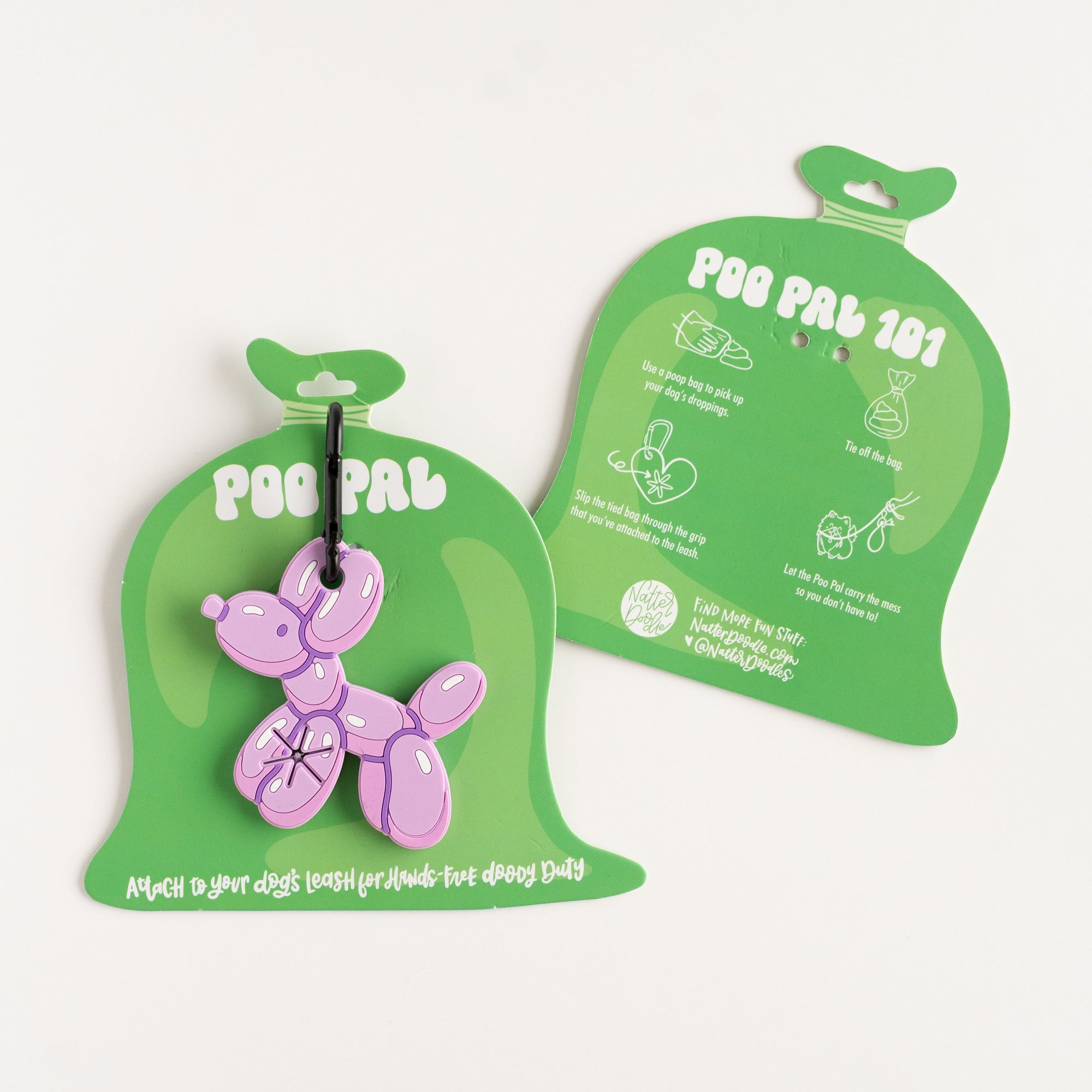 Two green dog waste bags with a pink balloon dog design on a white background