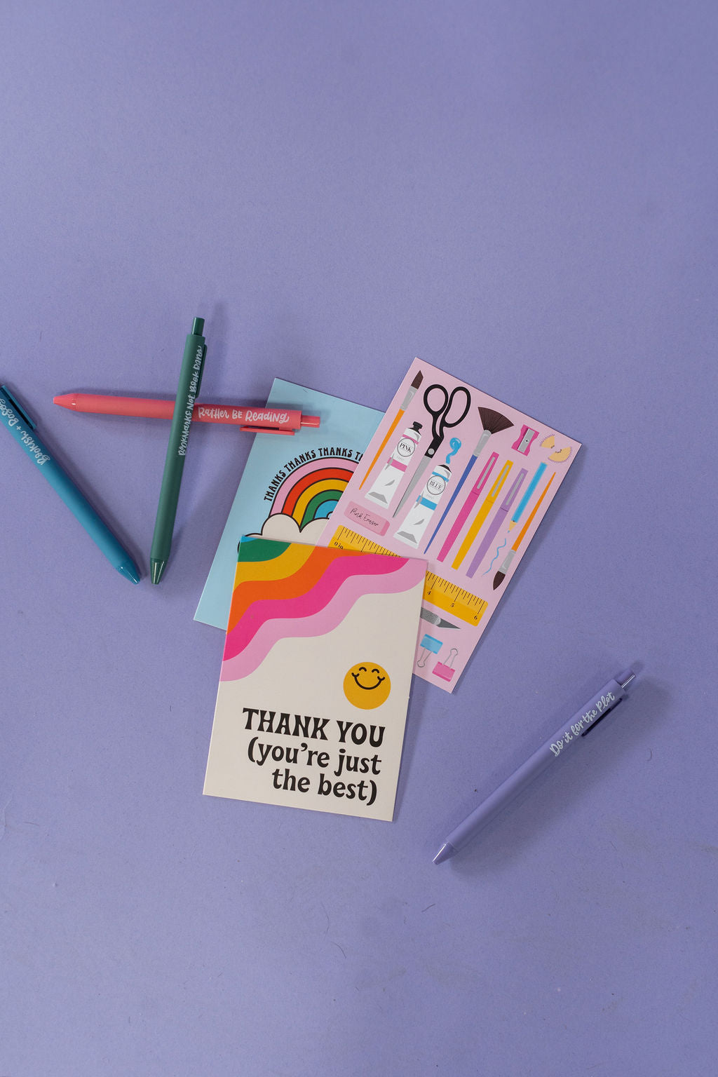 reading stationery on purple background