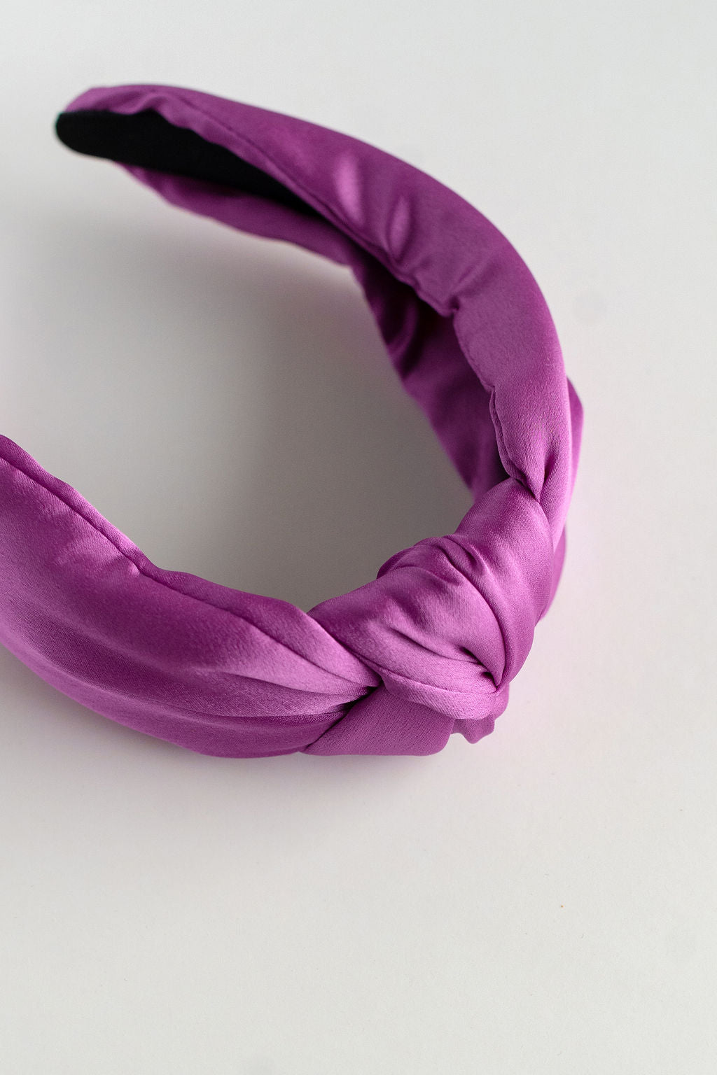 Purple headband on a white background