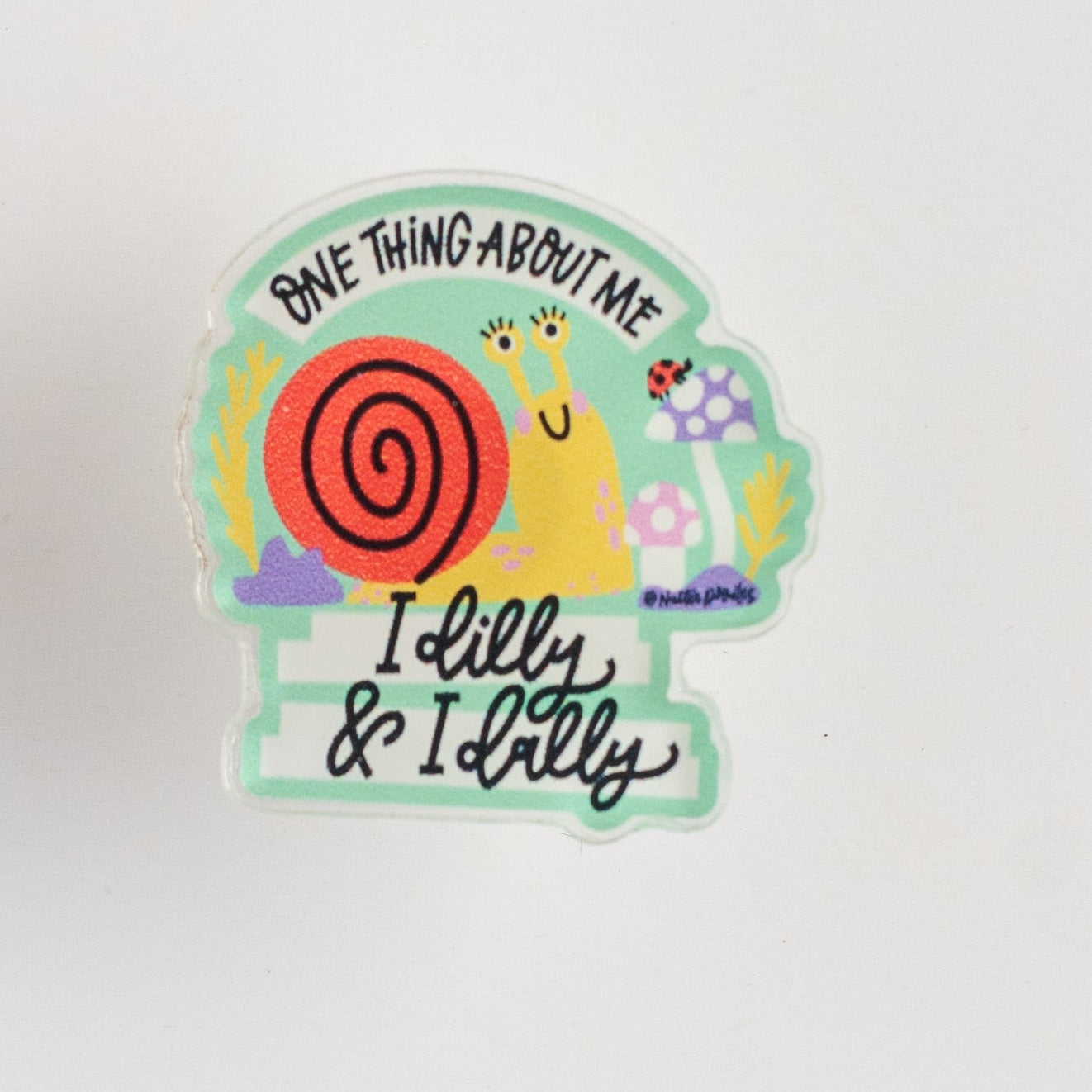 Colorful button with text and design on a white background