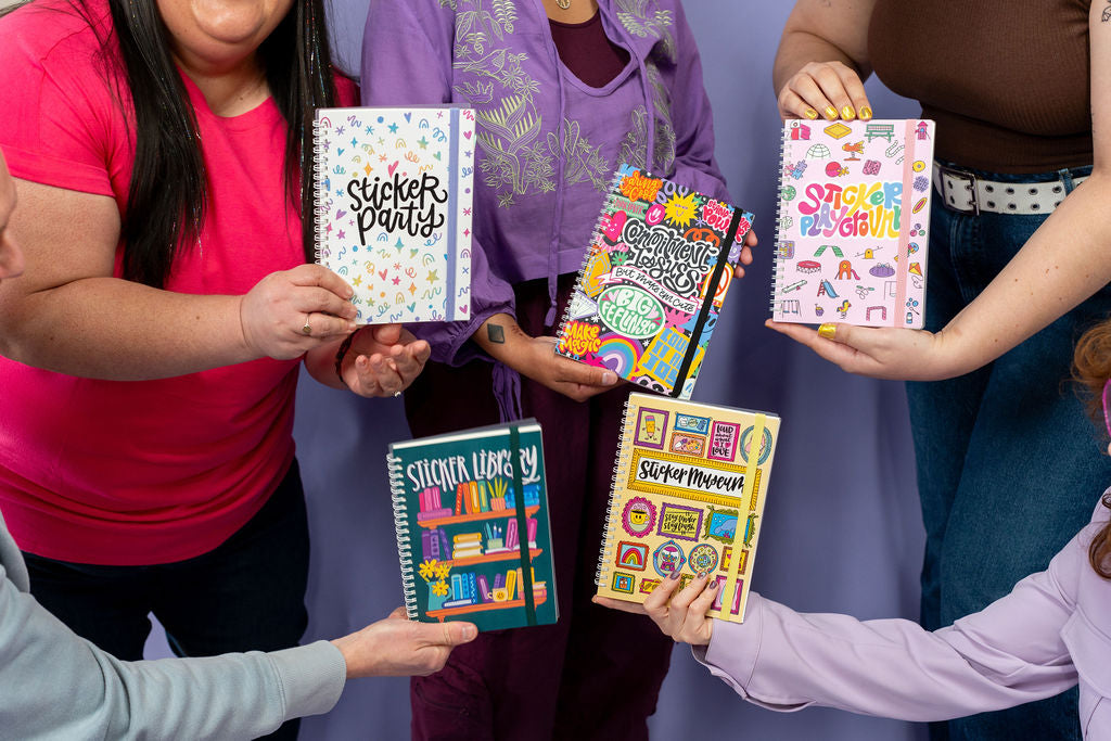 People holding colorful sticker books in a casual setting