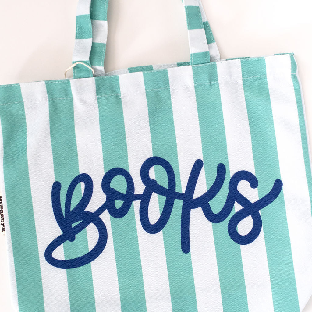 Striped tote bag with 'books' text on a white background