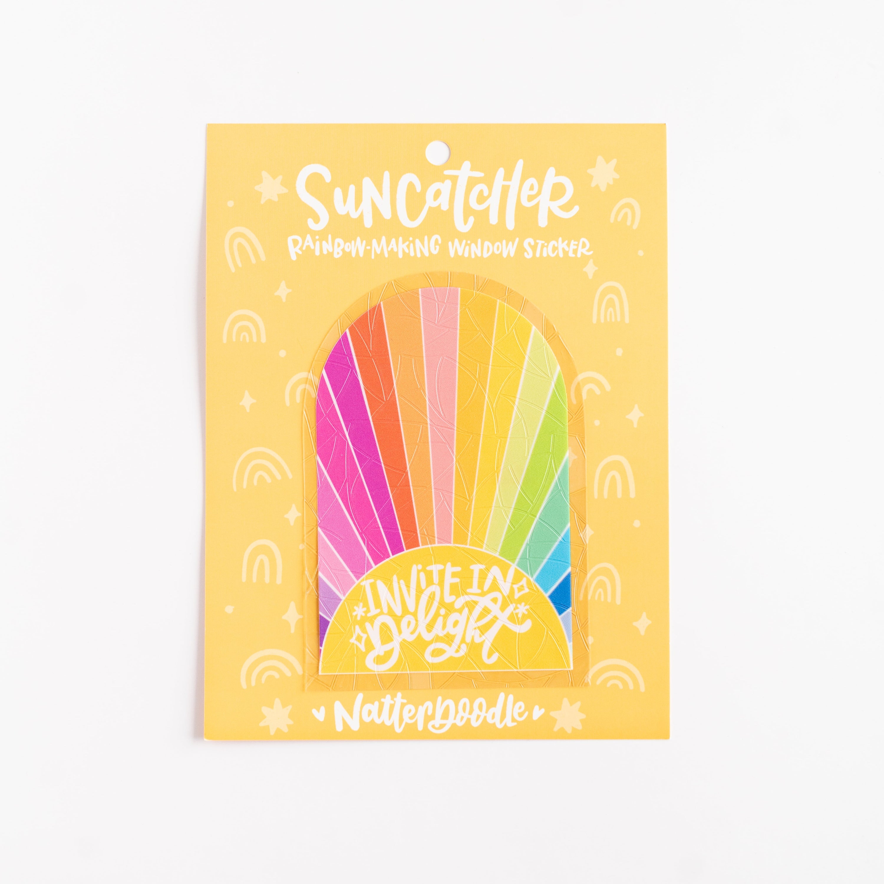 rainbow-colored paper sun catchers with a yellow background