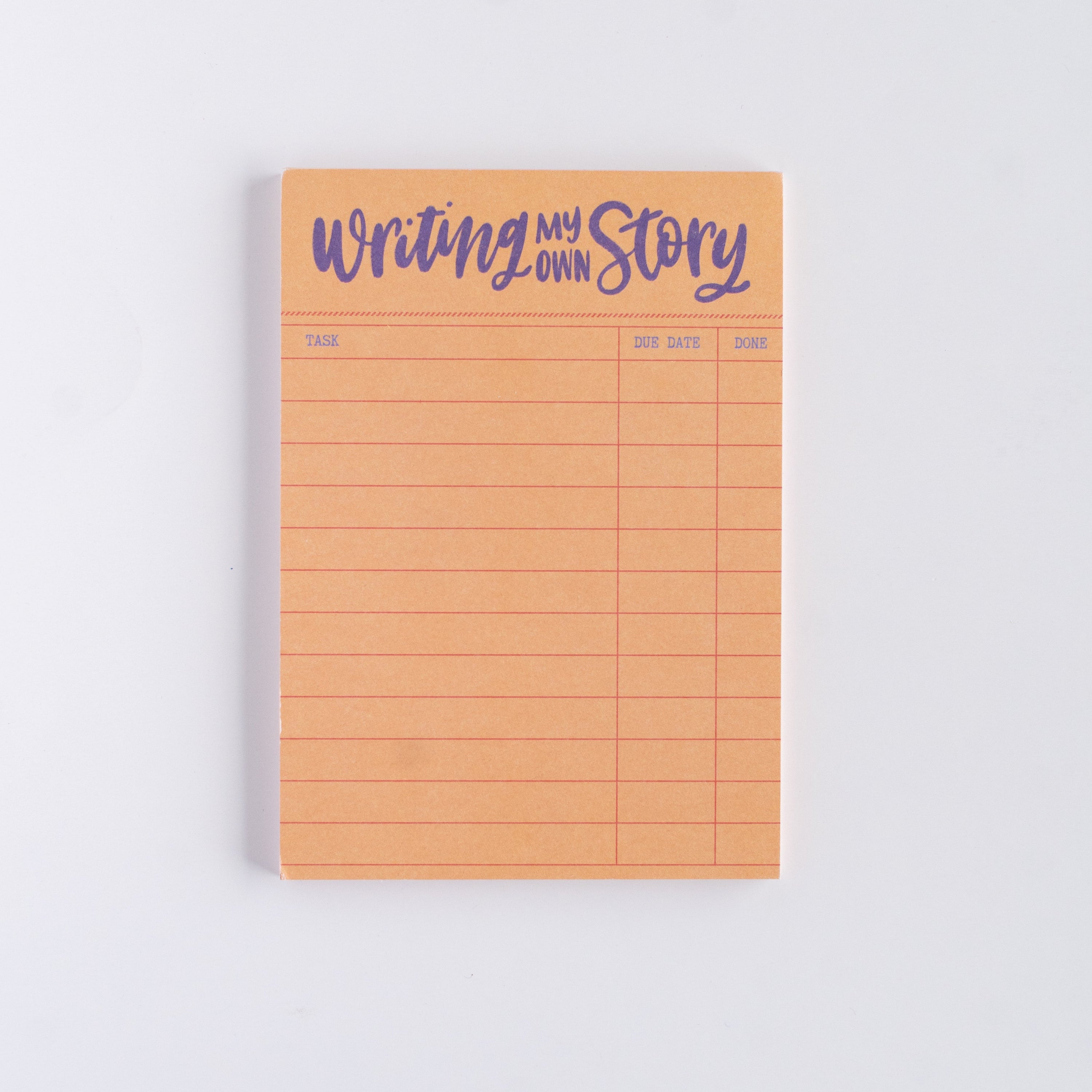 Notebook with 'Writing My Story' text on a white background